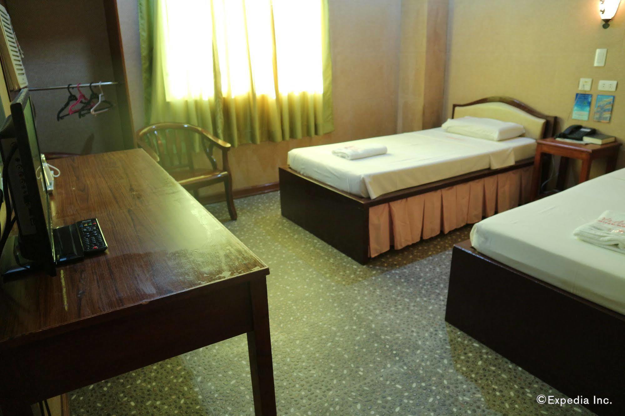 Obdulia'S Business Inn Dumaguete City Екстер'єр фото